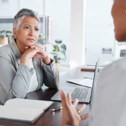 Woman listening to her doctor